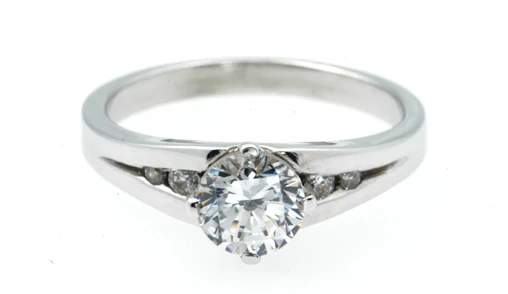 1003 Platinum split shank channel set engagement ring