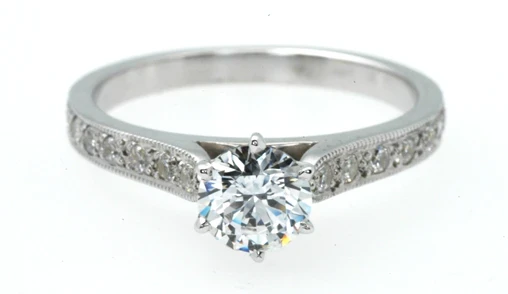 An elegant 0.80-carat engagement ring featuring a six-claw bead set design.