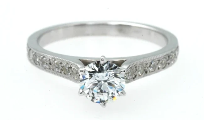 An elegant 0.80-carat engagement ring featuring a six-claw bead set design.