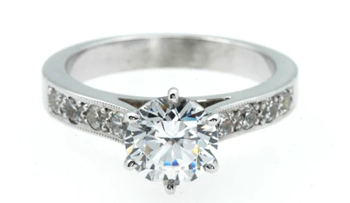 1012-Platinum six-claw 1.00ct diamond solitaire with pave shoulders