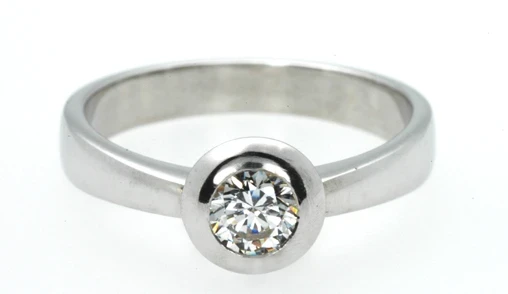 Bezel-set brilliant-cut diamond platinum ring. Aurum Fine Jewellery, Auckland NZ.