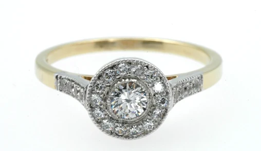 844 Brilliant cut halo engagement ring