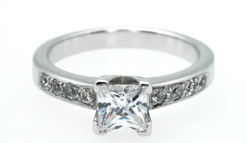 854P Princess diamond ring with bead set shoulders