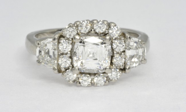 Crisscut diamond halo engagement ring